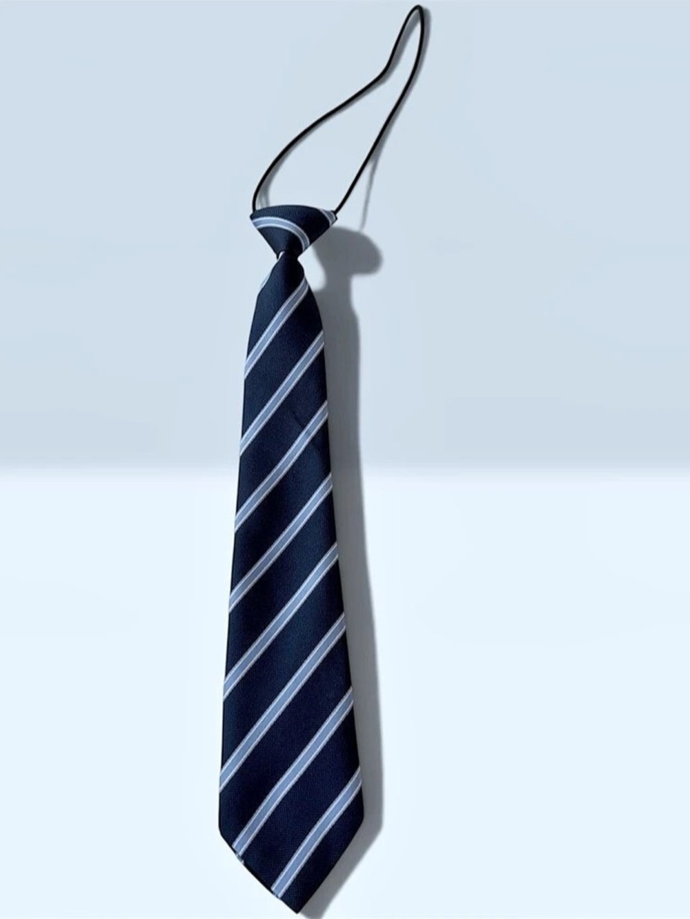 Pre-Tied Navy Striped Tie: Features classic light blue and white diagonal stripe